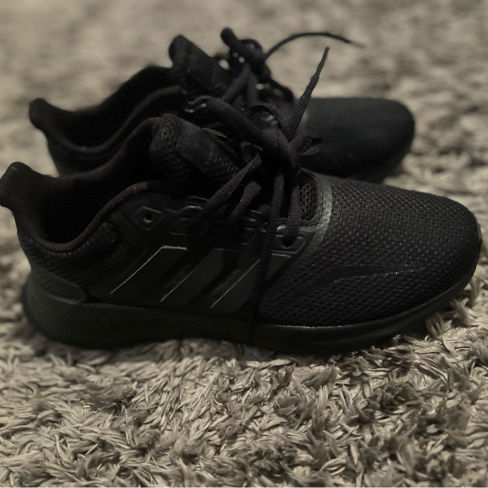Black Adidas sneakers